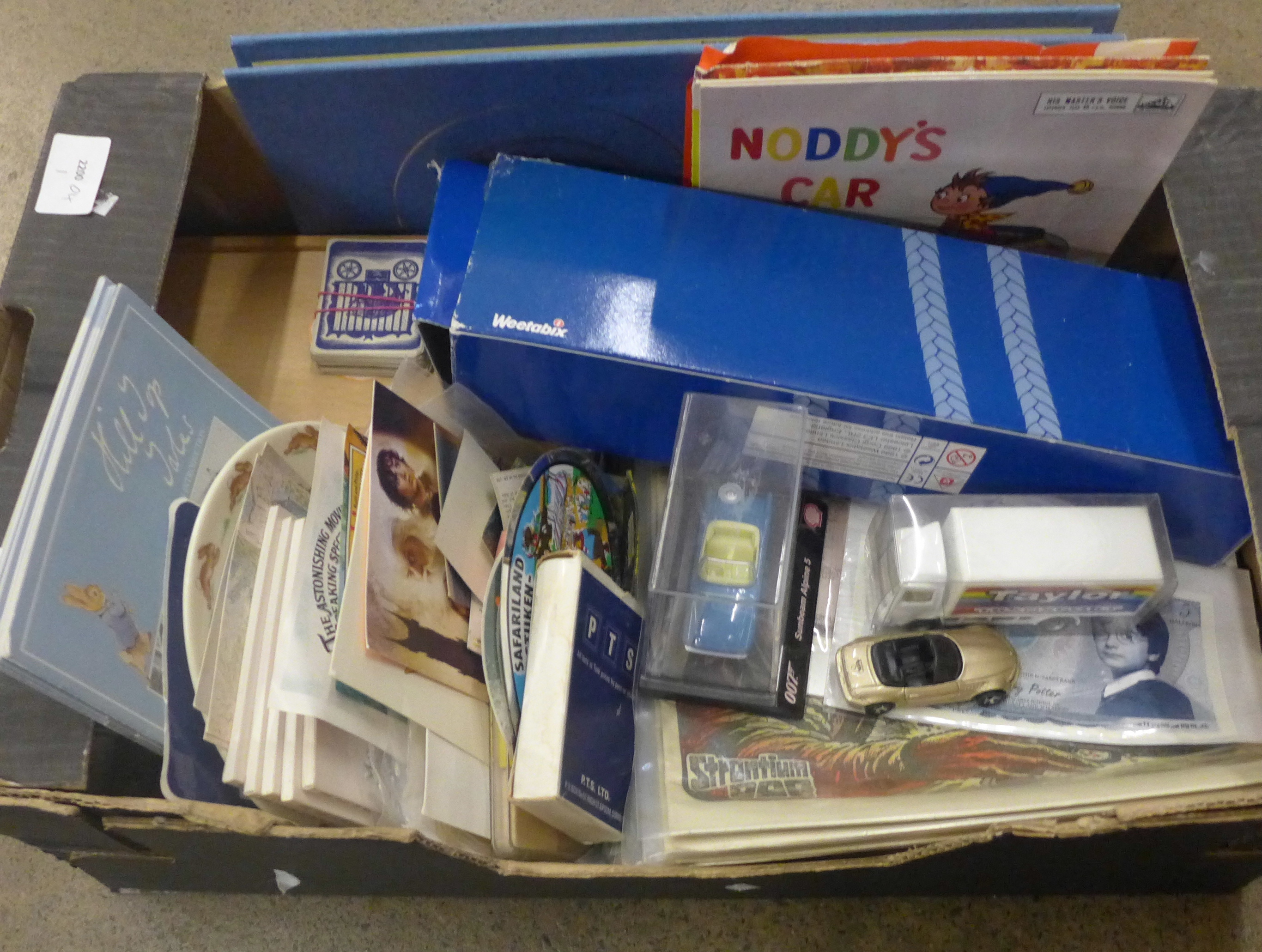 A box of comics, toys, children's records, etc.