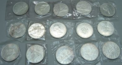 Fifteen 1960s Canadian dollar coins