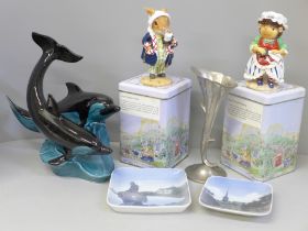 A Poole Pottery model of two dolphins, two Royal Copenhagen dishes, two Regency Fine Arts figures,