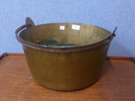 A Victorian brass jam pan