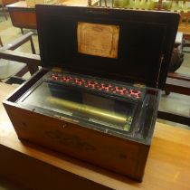 A 19th Century Swiss inlaid rosewood 10-air music box