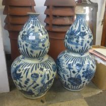 A pair of Chinese blue and white porcelain double gourd shaped vases