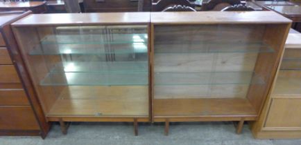 A pair of Turnidge of London teak display cabinets