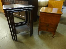 A walnut lady's sewing table and a mahogany nest of tables