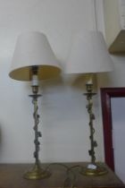 A pair of Valsan brass table lamps