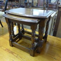 An oak nest of two tables