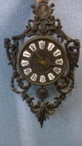 A French Rococo style metal figural cherub wall hanging clock