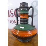 A West German green, brown and orange glazed pottery table lamp