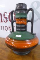 A West German green, brown and orange glazed pottery table lamp