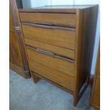 A teak chest of drawers