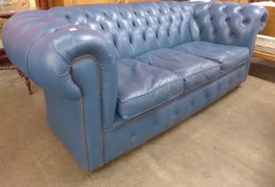 A blue leather Chesterfield settee