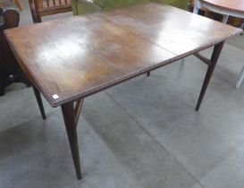 An Everest teak extending dining table