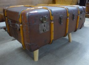 A vintage seamer trunk on legs