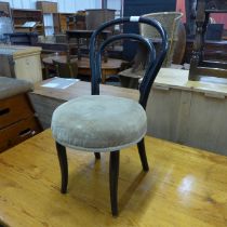 A child's ebonised bentwood chair