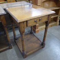 A George III style oak single drawer lamp table