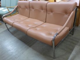 A Pieff chrome and tan leather settee