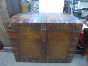 A Victorian oak and metal bound silver chest