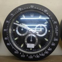 A Rolex style dealer's display wall clock