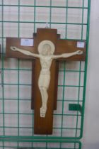 A French walnut and faux ivory crucifix