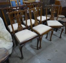 A set of six Chippendale style mahogany dining chairs