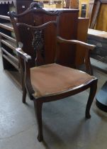 An Edward VII mahogany elbow chair
