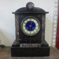 A 19th Century French Belge noir mantel clock