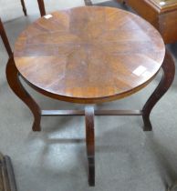 An Art Deco parquetry topped mahogany circular coffee table