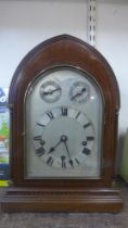 An early 20th Century German Winterhalder & Hofmeier inlaid mahogany bracket clock, chiming on
