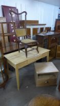 A beech single door kitchen table, a pine table and an Arts and Crafts beech chair