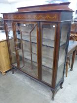 An Edward VII inlaid mahogany display cabinet