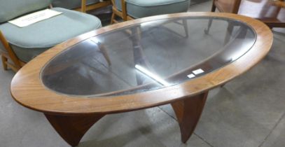 A G-Plan Astro teak and glass topped oval coffee table