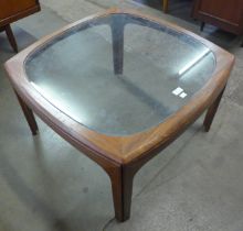 A G-Plan teak and glass topped coffee table