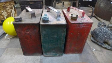 Three vintage Shell and Esso fuel cans