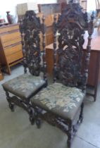 A pair of Charles II style carved walnut side chairs