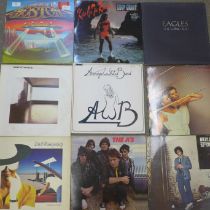 Twelve prog rock and other 1980s LP records