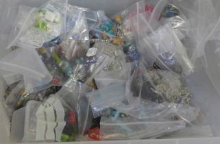 A large collection of beads on glass, foiled, etc.