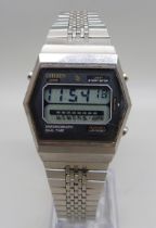 A Citizen 59-1017 dual time chronograph vintage LCD digital wristwatch, circa 1979