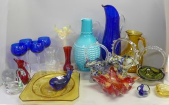 A collection of glassware including Murano baskets and coloured glass, a blue glass drink set with