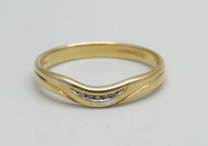 An 18ct gold ring set with five small diamonds, 2.5g, O/P