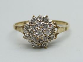 A 9ct gold and diamond cluster ring, 2.3g, W