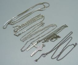Two silver chains, a silver pendant, a white metal pendant, and three other chains, 10g of marked