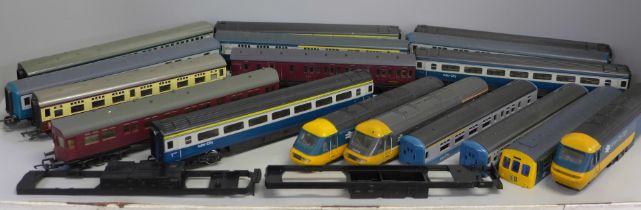 A collection of OO gauge coaches, engine bodies, etc., including Hornby