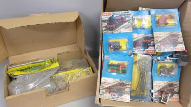 A collection of model rail scenery and accessories