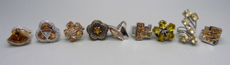 Nine chunky large silver rings, mostly set with citrine, 35mm, 118g