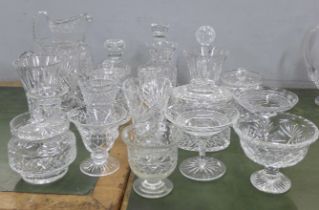 A large collection of crystal and glass vases, sweeetmeat dishes, pitchers, jugs, etc., twenty-two