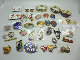 A collection of cloisonne and enamel jewellery
