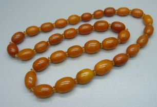A butterscotch amber bead necklace, 78g