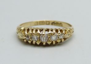 An 18ct gold, five stone diamond ring, 2.4g, K