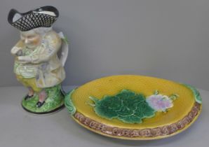 A Victorian majolica bread plate, Adams & Bromley, geranium pattern, unmarked, and a Toby jug