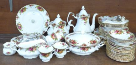Royal Albert Old Country Roses tea and dinnerwares, teapot, coffee pot, two cake stands, plates,
